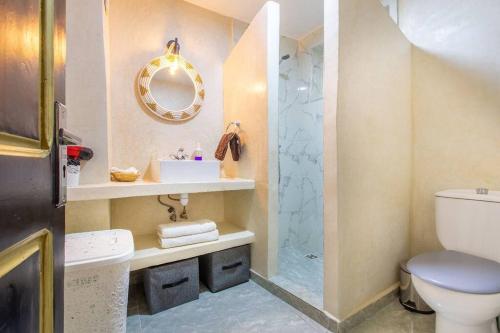 a bathroom with a toilet and a sink and a shower at House with Hot Tub Private - Close to Hivernage District in Marrakesh