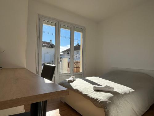 Posteľ alebo postele v izbe v ubytovaní Maison plain-pied Tarbes