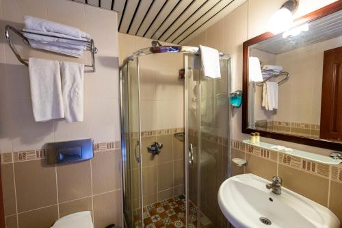Ванная комната в ASTORIA PARK HOTEL & Spa ALL INCLUSIVE CONCEPT
