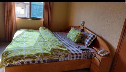 Cama ou camas em um quarto em La Chambre De Pat Hotel