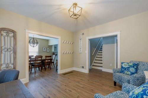 a living room with a couch and chairs and a dining room at The Queen Place - Updated-Private Backyard in Gordonville