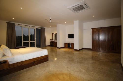 Hotel Refresh Blueにあるベッド
