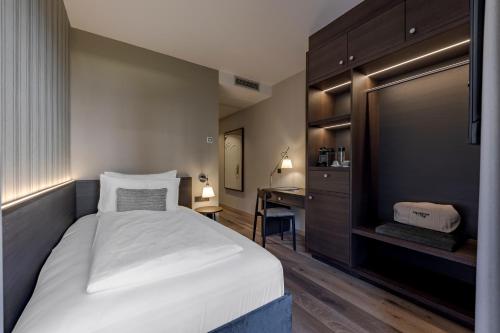 Postel nebo postele na pokoji v ubytování Hotel Magdalener Hof