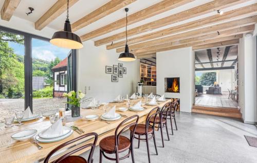 a large dining room with a long table and chairs at Amazing Home In Eiterfeld With Wifi in Eiterfeld