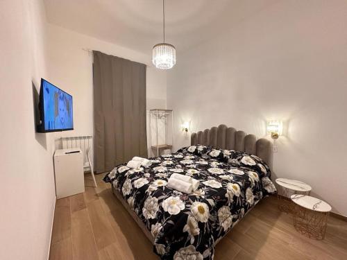 Postel nebo postele na pokoji v ubytování Domus Iulius