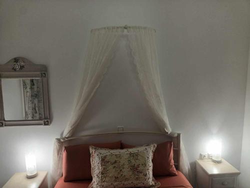 Postel nebo postele na pokoji v ubytování Lina's House Sivota