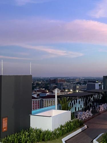 a view of the city from the roof of a building at BlissFul Homestay_Horizon@IPOH in Ipoh