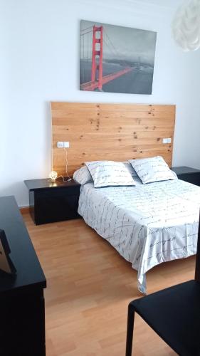 Ένα ή περισσότερα κρεβάτια σε δωμάτιο στο Casa Camilo