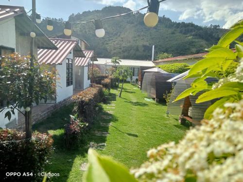 a view of the yard of a house at CASA BAHAREQUE HOSPEDAJE in Monguí