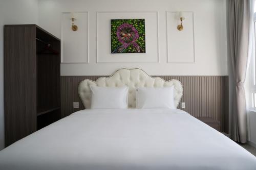 Cama o camas de una habitación en Paris Hotel Châu Đốc
