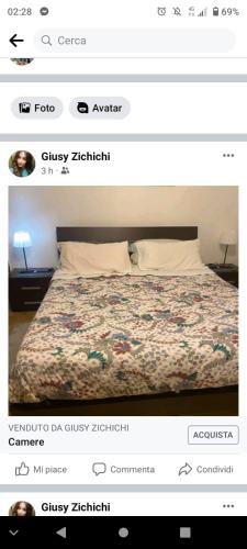 En eller flere senge i et værelse på Da Giusina