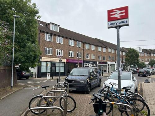 a row of bikes parked next to a street at Highfield Home with free parkings, Surbiton, Kingston upon Thames, Surrey, Greater London , UK in Surbiton