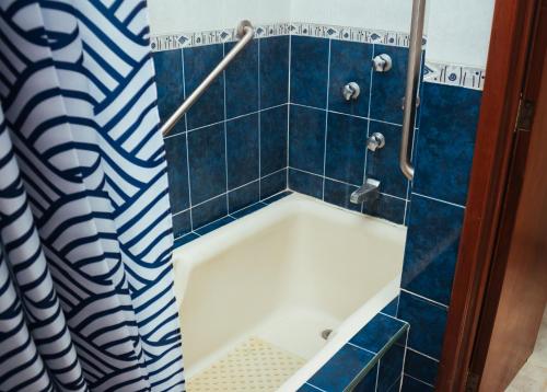 Ванная комната в A unos pasos de la Playa,disfruta la tranquilidad villa 9
