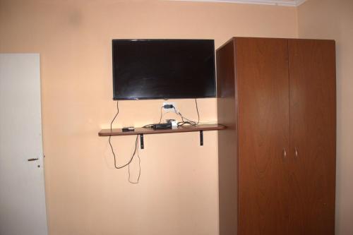 TV a/nebo společenská místnost v ubytování CV Apart