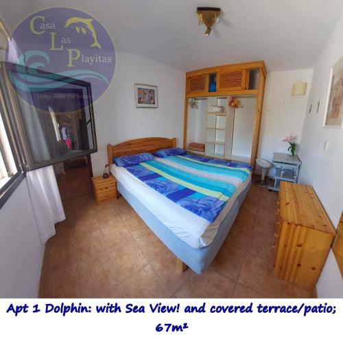 1 dormitorio con 1 cama grande en una habitación en CASA LAS PLAYITAS -CLP- BEST SEA VIEW - In 1 Minute Ocean, en Las Playitas