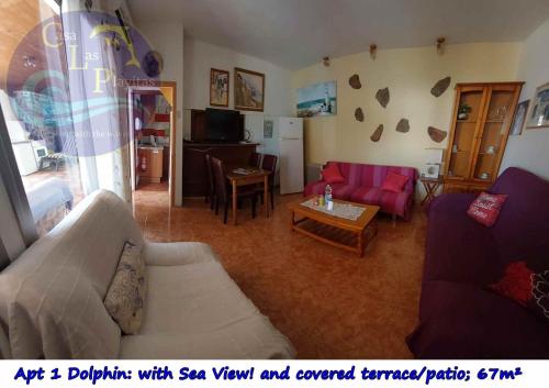 a living room with two couches and a table at CASA LAS PLAYITAS -CLP- BEST SEA VIEW - In 1 Minute Ocean in Las Playitas