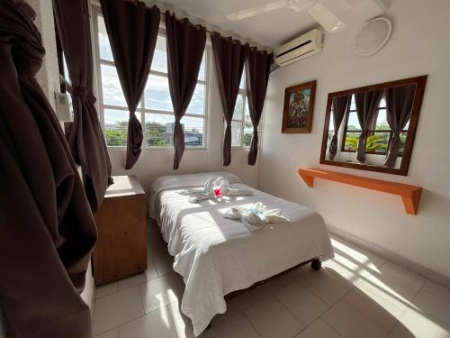 Katil atau katil-katil dalam bilik di Hotel Bello Caribe