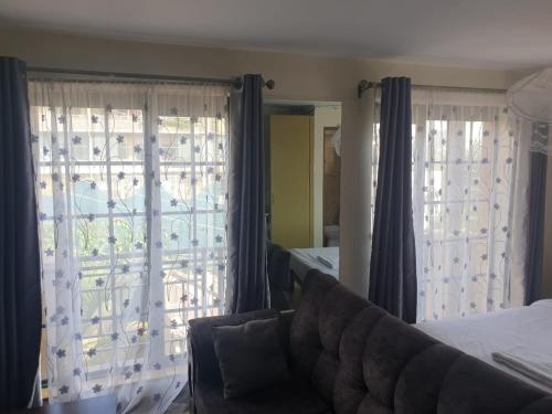 Zona d'estar a Mvuli suites studio