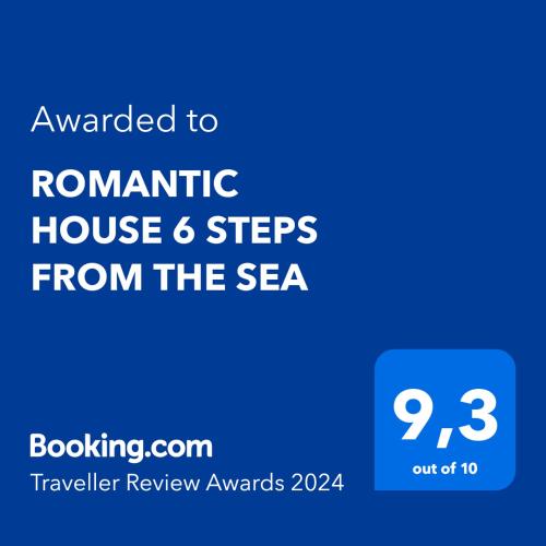 a blue text box with the words romantic house steps from the sea at ROMANTIC HOUSE 6 STEPS FROM THE SEA in Mochlos