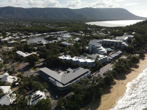 an aerial view of the resort and the beach at Blue Lagoon Villas in Trinity Beach