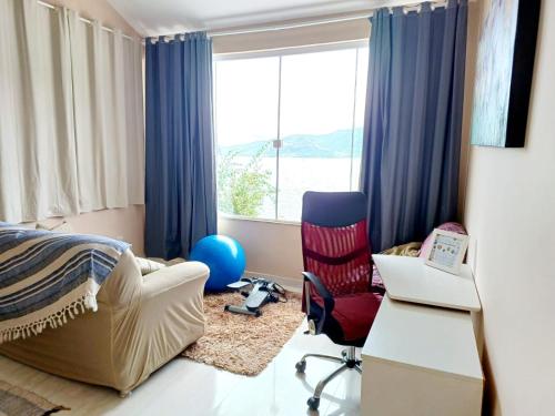 Cama o camas de una habitación en Casa na Ilha Jardim pé na areia