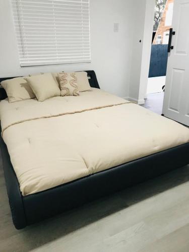 a large bed sitting in a room with at 10515 Houston Avenue in Hudson