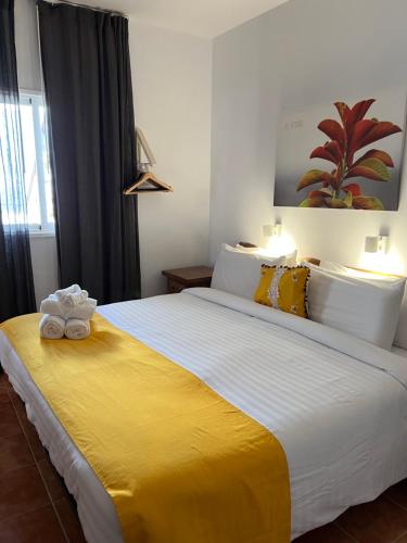 Katil atau katil-katil dalam bilik di Geko Hotels