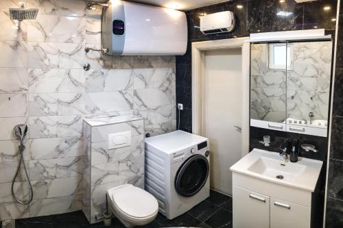 Ванная комната в Oaza Lux Apartment