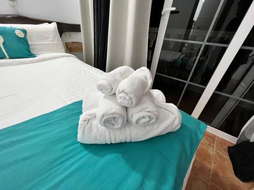 Katil atau katil-katil dalam bilik di Geko Hotels