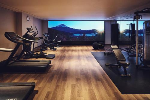 a gym with a view of a mountain on the screen at Hotel Indigo Hakone Gora by IHG in Hakone
