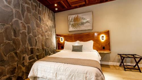 Postel nebo postele na pokoji v ubytování Hotel Boutique Los Abetos