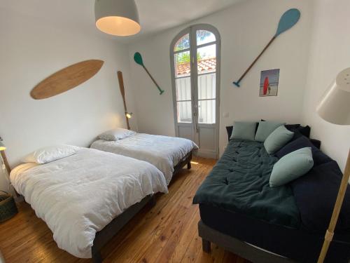 Photo de la galerie de l'établissement Villa avec Piscine, WIFI et Jardin au Coeur des Abatilles, Proche Plage et Commerces - FR-1-374-202, à Arcachon