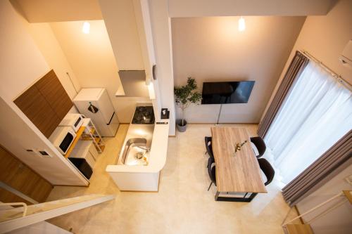 Μια τηλεόραση ή/και κέντρο ψυχαγωγίας στο Ekimae apartment