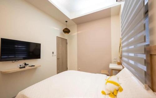 Ein Bett oder Betten in einem Zimmer der Unterkunft Light of the Dawn