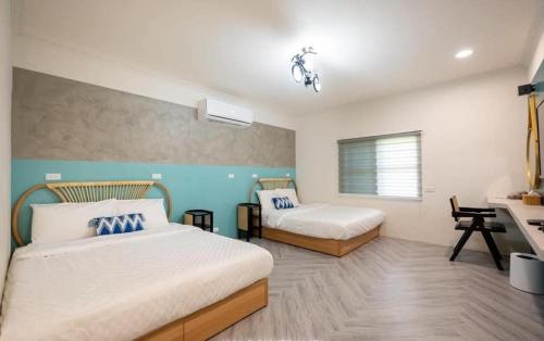 Ein Bett oder Betten in einem Zimmer der Unterkunft Light of the Dawn