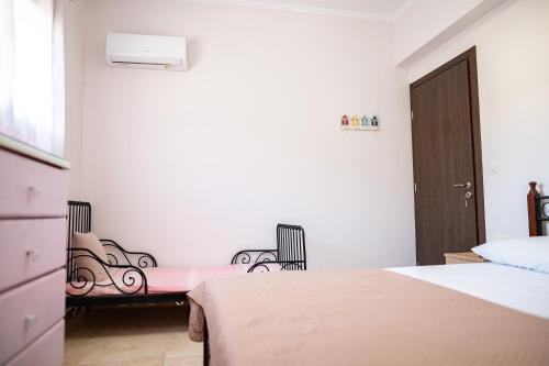 Katil atau katil-katil dalam bilik di Irini's house afandou