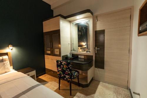 Cama o camas de una habitación en Hive Service Apartment
