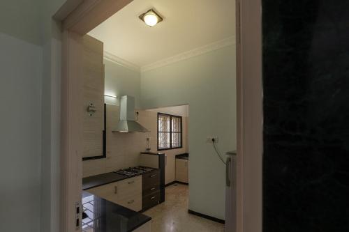 Kuchyň nebo kuchyňský kout v ubytování Hive Service Apartment