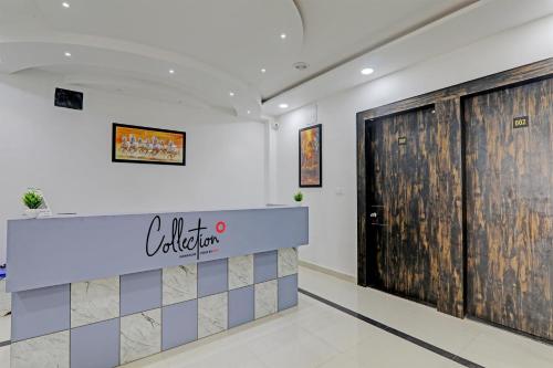 a lobby of a store with a sign on the wall at OYO Flagship THE VINDH in Gorakhpur