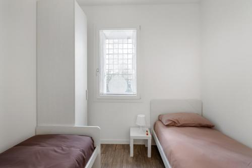 Katil atau katil-katil dalam bilik di Civico 36 a due passi dal Centro