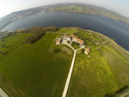 an aerial view of a house on an island in the water at B&b Il Gheppio in Campolattaro