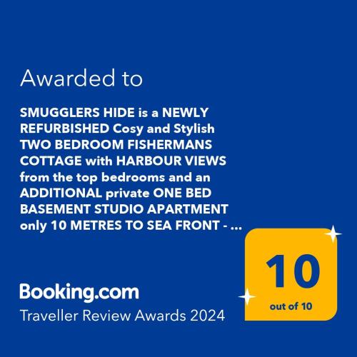 a screenshot of a text box with the number at "SMUGGLERS HIDE" & "SMUGGLERS CABIN" - A 2 Bedroom FISHERMANS COTTAGE with Childs Bunk and HARBOUR VIEWS - and also a private entrance connecting 1 BED STUDIO - 10 Metres To Sea Front - 2023 GLOBAL REFURBISHMENT AWARD WINNER in St Ives