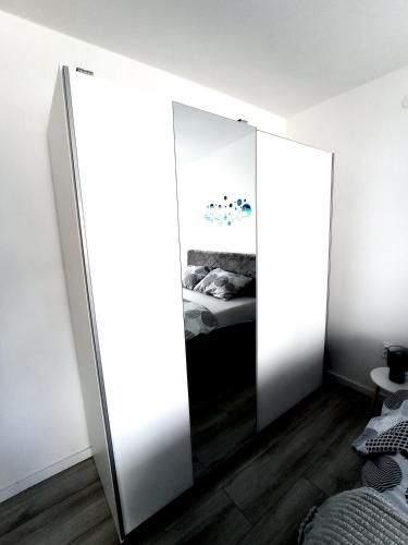 Postel nebo postele na pokoji v ubytování Apartman Sunce