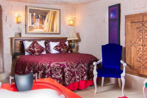 Кровать или кровати в номере Cappadocia Fairy Chimneys Selfie Cave Hotels - Special Class