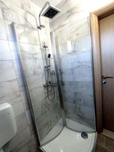 Koupelna v ubytování Apartman Sunce