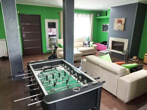 a living room with a large pool table at Relax nel verde in Bracciano