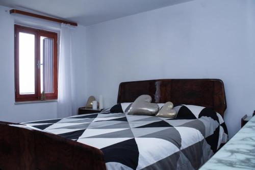Una cama o camas en una habitación de Casa Mersino