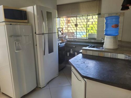 Virtuvė arba virtuvėlė apgyvendinimo įstaigoje Rancho Morro do Cristo - Ribeirão Claro PR