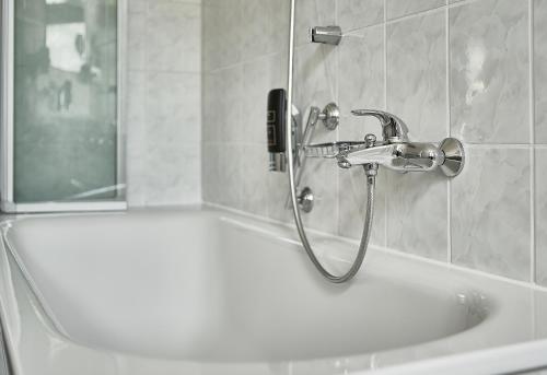 Koupelna v ubytování Teichhotel