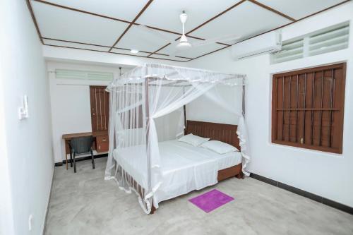 Krevet ili kreveti u jedinici u okviru objekta Sripali villa